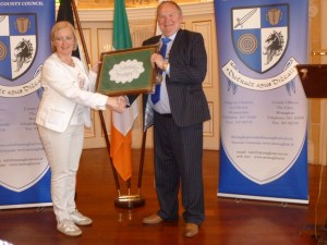 Monaghan Mayor Hugh McElvaney presents a gift of Clones Lace to Geel Mayor Vera Celis