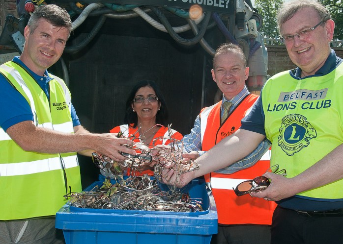 Belfast Lions Club President Michael Fisher with Cllr Steven Corr & representatives of ArtsEkta & Extern Photo: Ken Oliver 