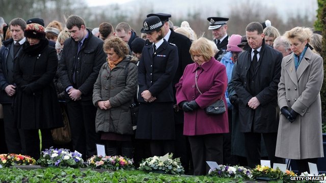 Families and relatives at Dryfesdale cemetery, Lockerbie  Photo: Getty Images ex BBC News