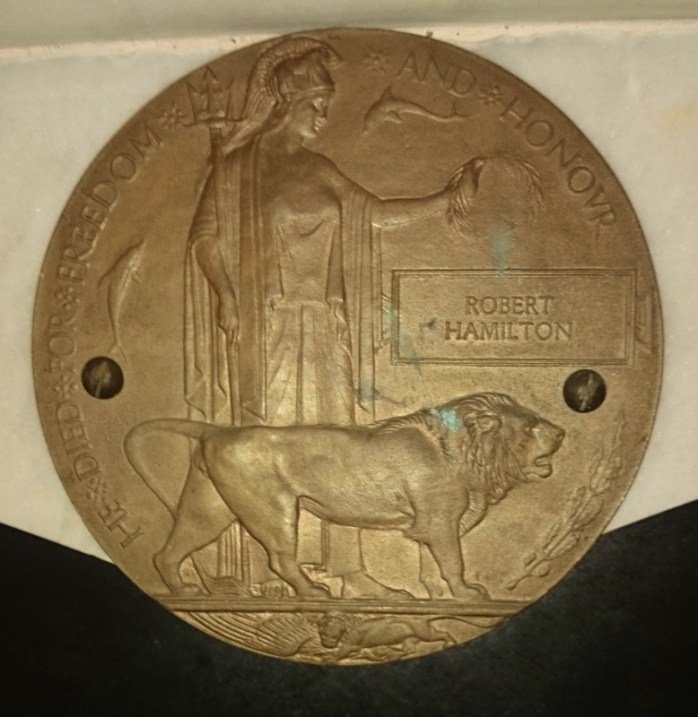 'Dead Man's Penny' with Robert Hamilton's name in the plaque in Ballinode