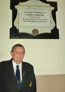 Michael Fisher at the plaque for Robert Hamilton at St Dympna's Church, Ballinode Photo: © Evelyn Fisher