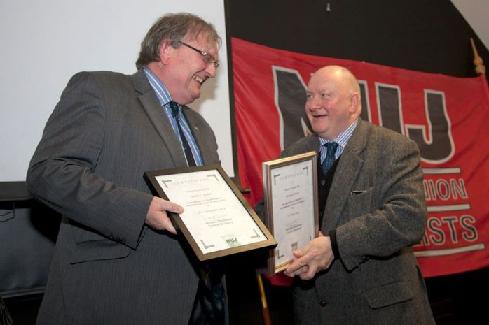 Michael Fisher presented with NUJ life membership by Seamus Dooley  Photo:  © Kevin Cooper