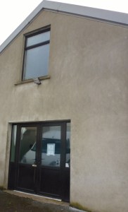 Proposed entrance (with planning notice) to a private members gaming club on ground floor of a vacant commercial unit at rear of Carrickmacross shopping centre Photo: © Michael Fisher  