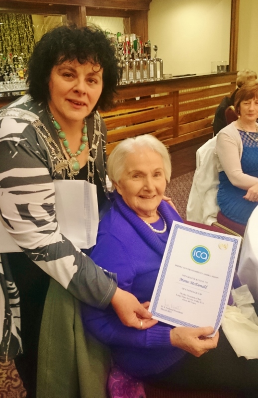 ICA National President Liz Wall presents a certificate for 60 years' membership to one of her predecessors, Mamo McDonald from Clones guild Photo: © Michael Fisher