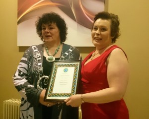 ICA Scotshouse guild member Lorna Soden presents ICAresident Liz Wall with a glazed glass framed certificate she made Photo: © Michael Fisher