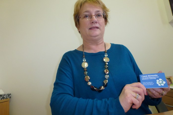Maeve Montgomery, Alzheimer Society, with dementia card at Carrickmacross Wokhouse  Photo: © Michael Fisher