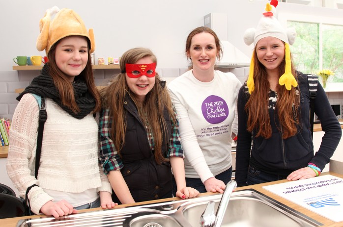 Taking the 'Chiecken Challenge' at Balmoral Show: (L-R) Lynsey Forde, Laura Louise Reay and Aoife Murphy from Monaghan town alongside (centre) Elaine Donaghy of the NI Food Standards Agency ©Brian Thompson Photography