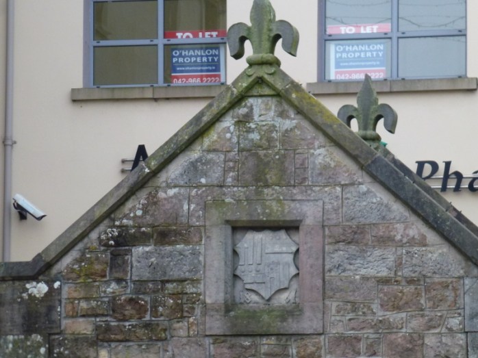 The Toll House, Carrickmacross: Fleur-de-Lys decoration and Shirley crest dated 1861  Photo:  © Michael Fisher 