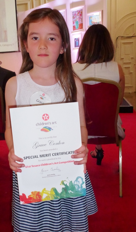 Grace Conlon, Lannat,  Killanny, receives her special merit certificate for her painting "Bird Tunes".   Photo:  © Michael Fisher