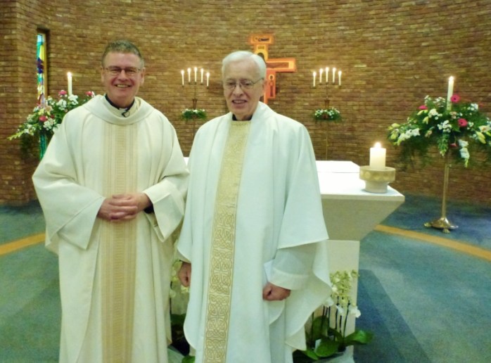 Fr Eddie O'Donnell, Parish Priest, St Brigid's Belfast and Canon Brian McCluskey (right) at the Mass marking his 55th anniversary as a priest. Photo:  © Michael Fisher   