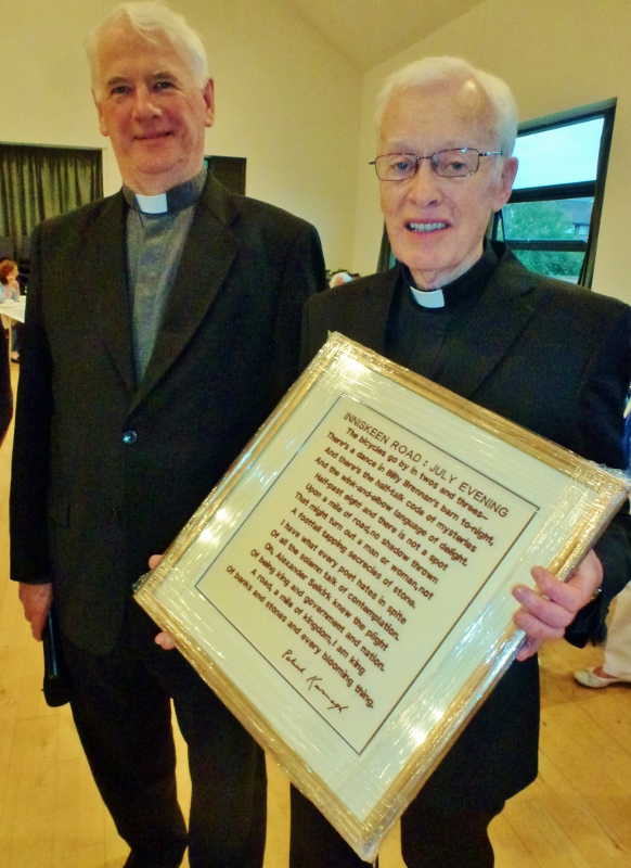 Bishop of Down and Connor, Dr Noel Treanor with Canon Brian McCluskey, who was presented with an embroidered copy of a Patrick Kavanagh poem about Inniskeen.  Photo:  © Michael Fisher