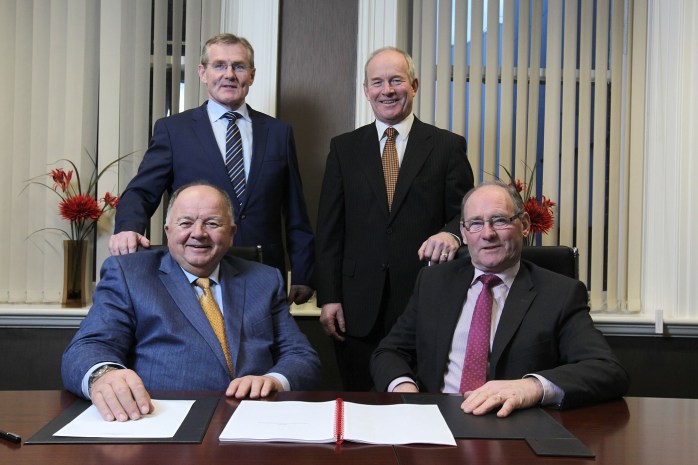 Standing are Gabriel D’Arcy (Chief Executive of newly formed LacPatrick Co-op) and Nigel Kemps (Deputy Chief Executive LacPatrick Co-op), with (seated) Hugo Maguire (Chairman, LacPatrick Co-op) and Roy Irwin Deputy Chairman. Photo: © Brian Thompson Photography